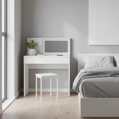 A sleek, modern white flip-top vanity table with the mirror closed, showing a clear desktop surface, in a bright bedroom.